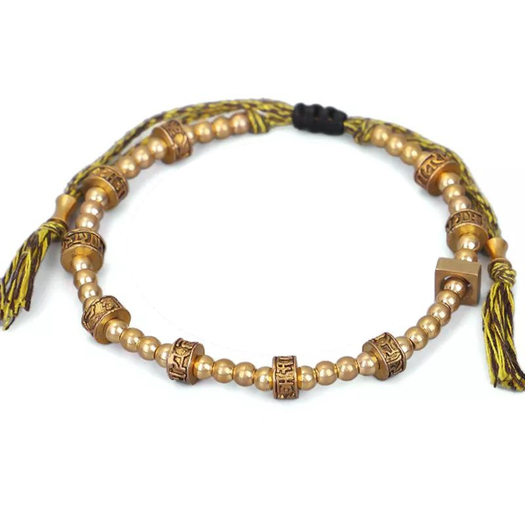 Bracelet tibétain corde perles et moulin a prière Ohm